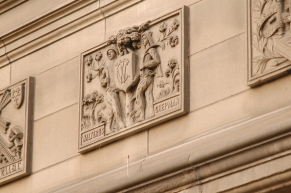 One of nine small square reliefs on the exterior of Edinburgh Central Library