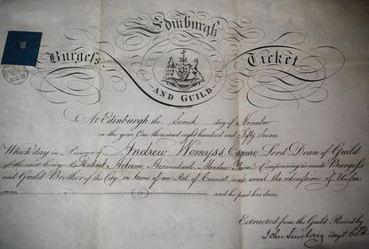 A certificate has a fancy decoration at the top around the words, Edinburgh and Guild, Burgess Ticket.