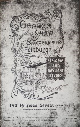An advert for George Shaw photographer's studio has an illustration of its location on Princes Street.